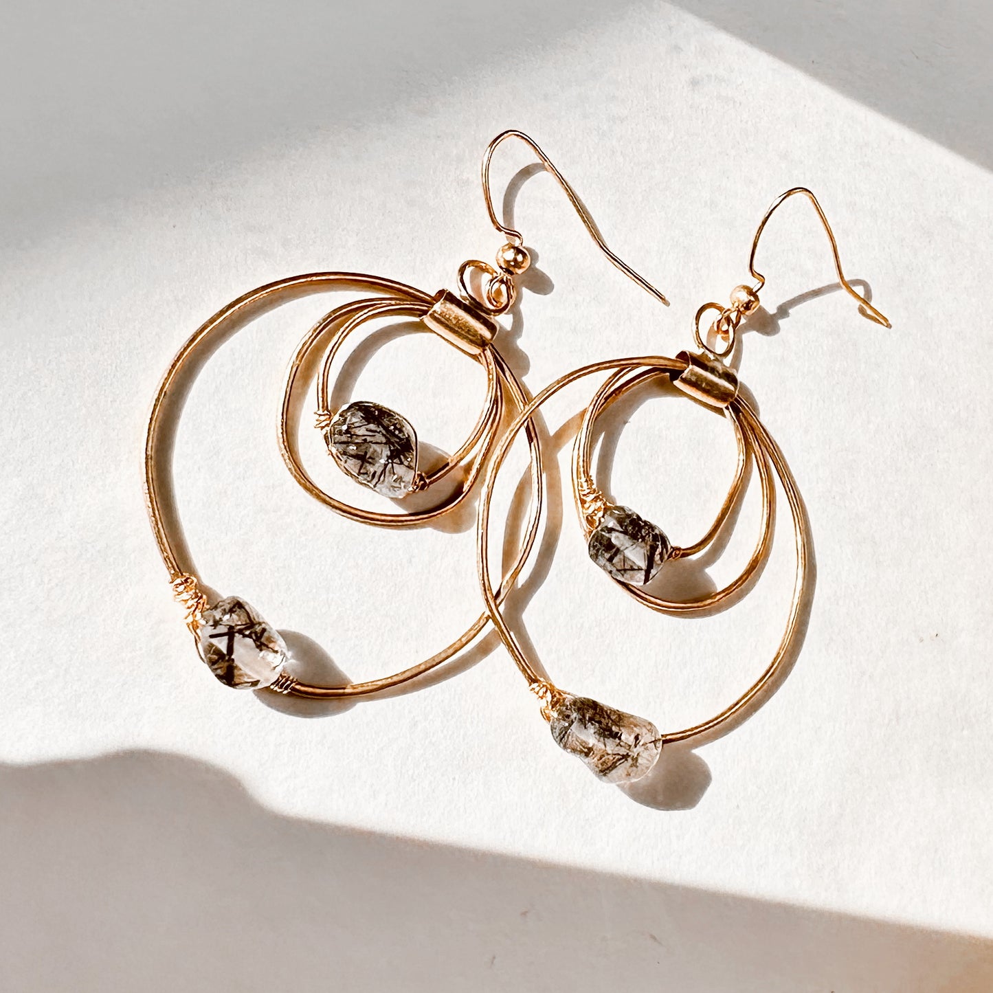 Celestara Eclipse Black Tourmaline Rutilated Quartz Earrings Hand-Forged Brass Hoops