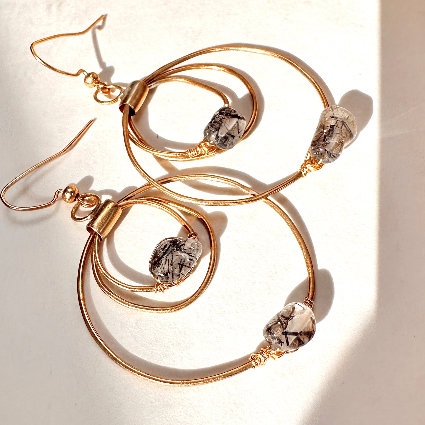 Celestara Eclipse Black Tourmaline Rutilated Quartz Earrings Hand-Forged Brass Hoops